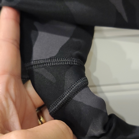 Practically brand new!  Athleta Ultimate 7/8 tights in black camo print. Size XS - Picture 8 of 9